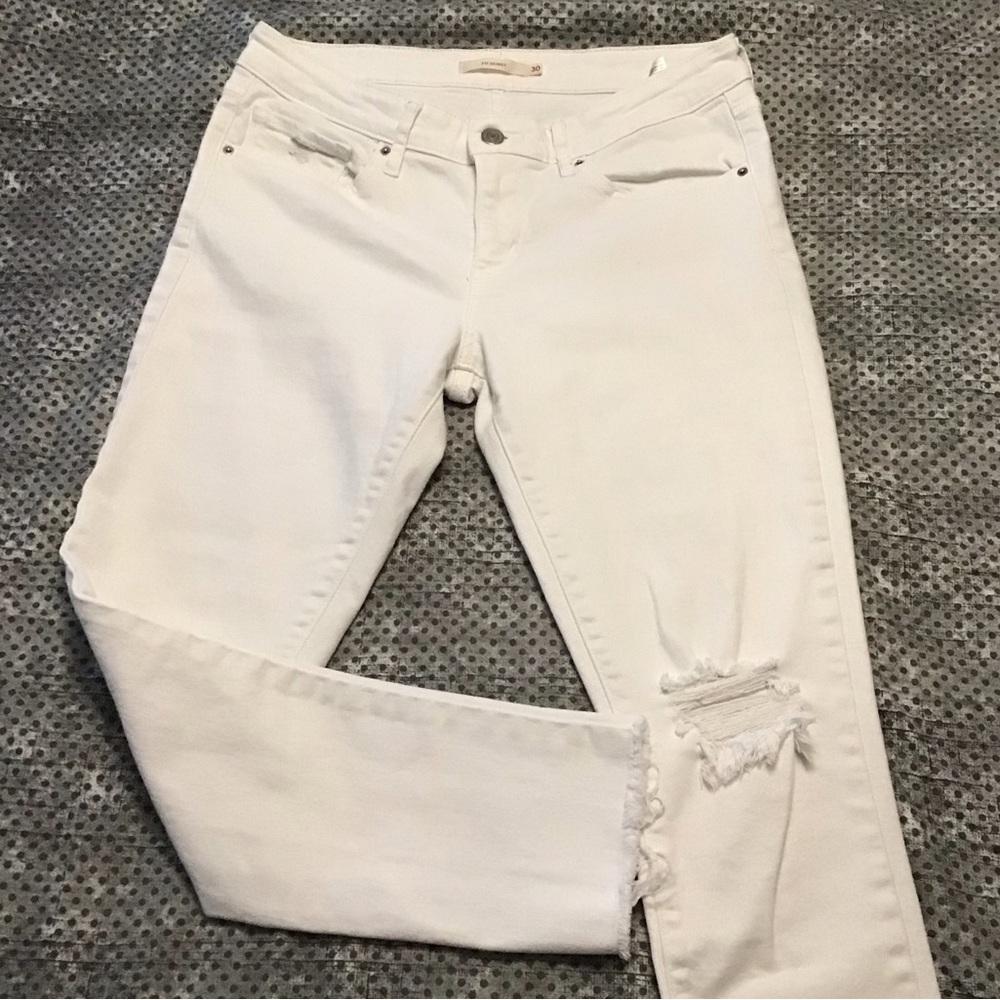 Levi’s 711 Skinny White Jeans.  Distressed with Raw Hem  Size 30